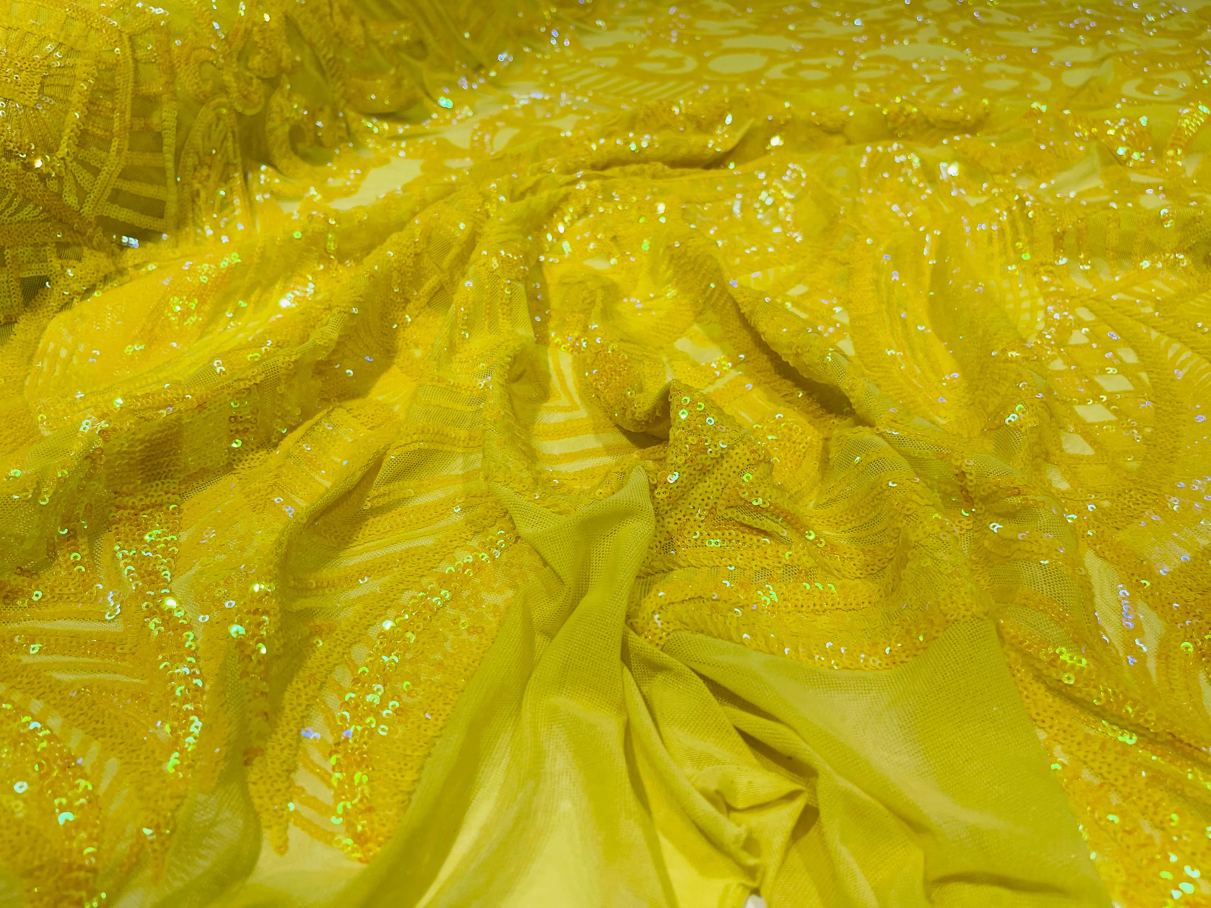 Bright Yellow iridescent royalty design on a 4 way stretch mesh-prom-sold by the yard.