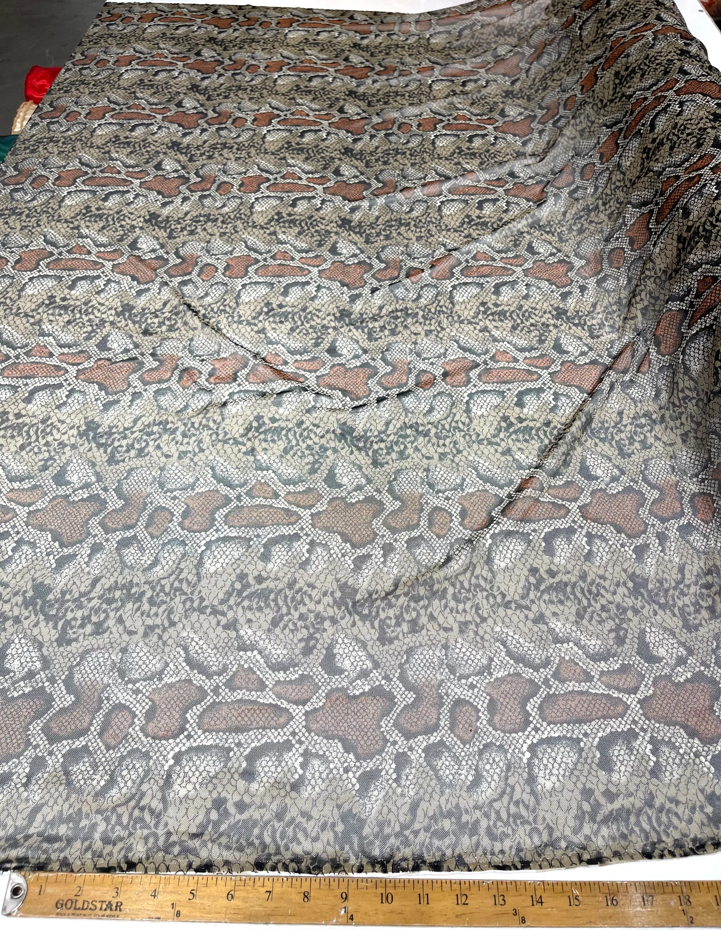 Brown/ Black rattle snake design on a power mesh 4-way stretch 58"-Sold by the yard.