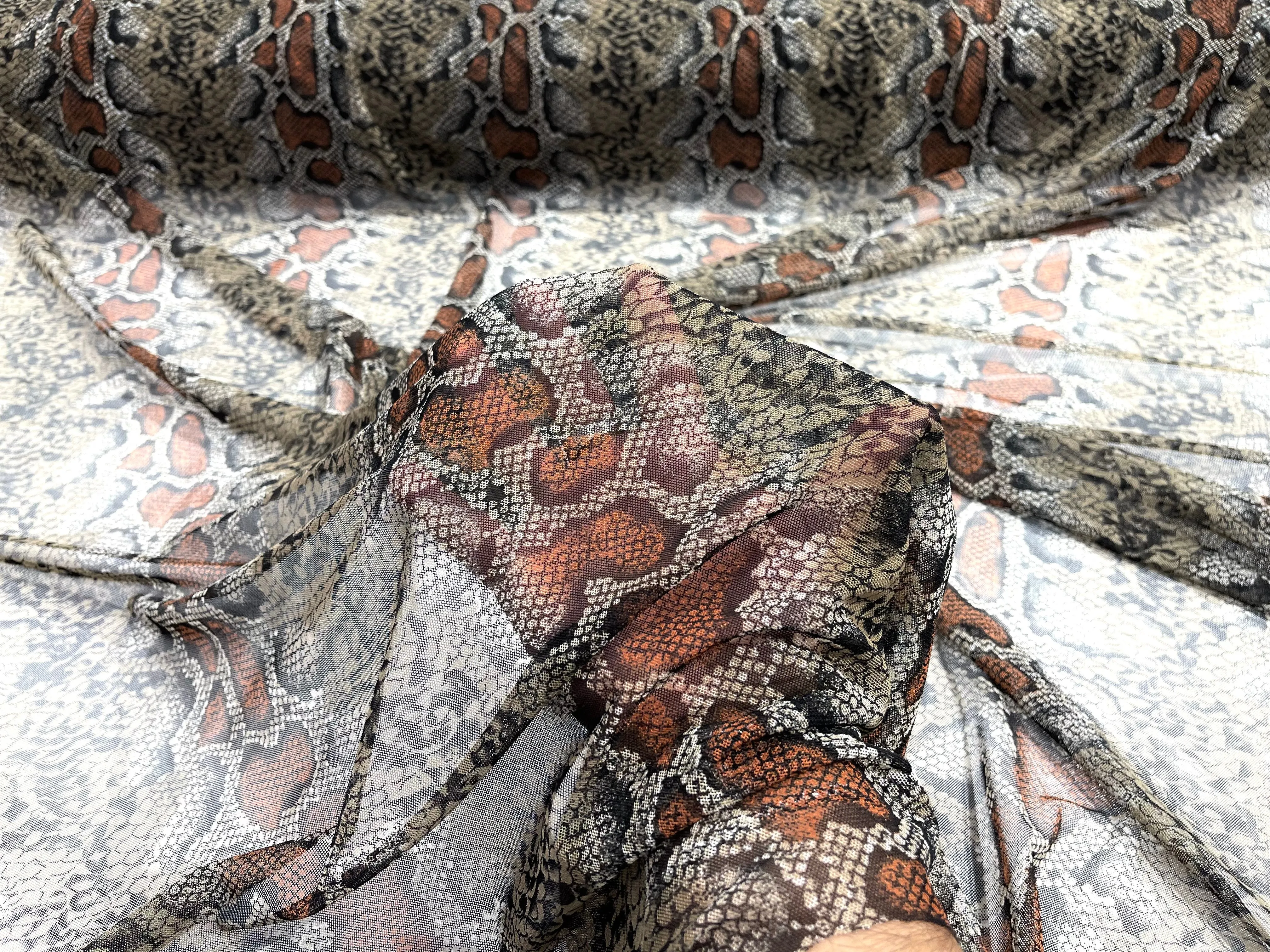 Brown/ Black rattle snake design on a power mesh 4-way stretch 58"-Sold by the yard.