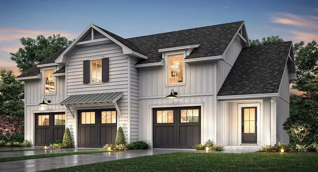 Charming Carriage House Plan with Spacious Garage and Cozy Living