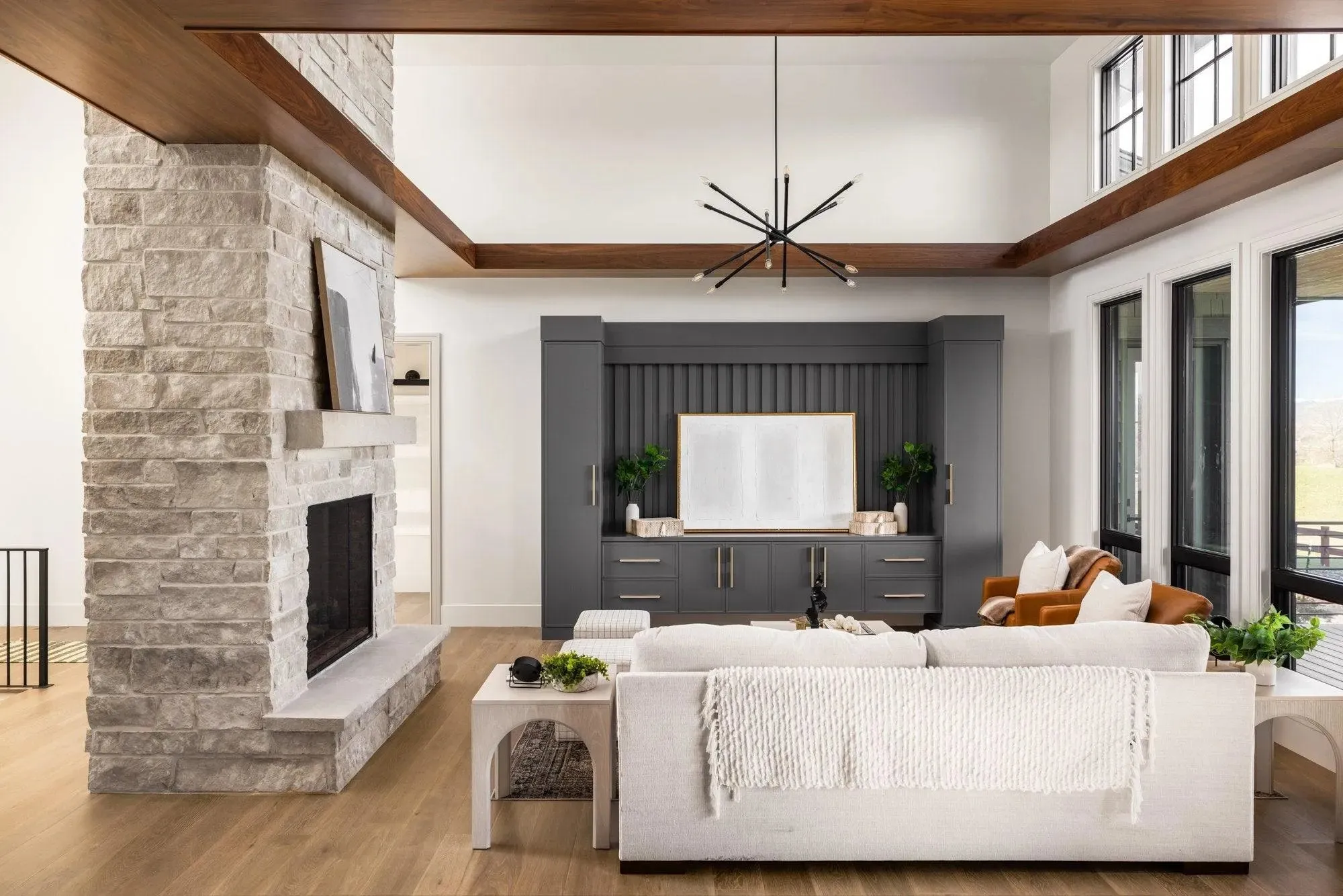 Elegant 2-Bedroom Home with Spacious Basement and Expansive Porches