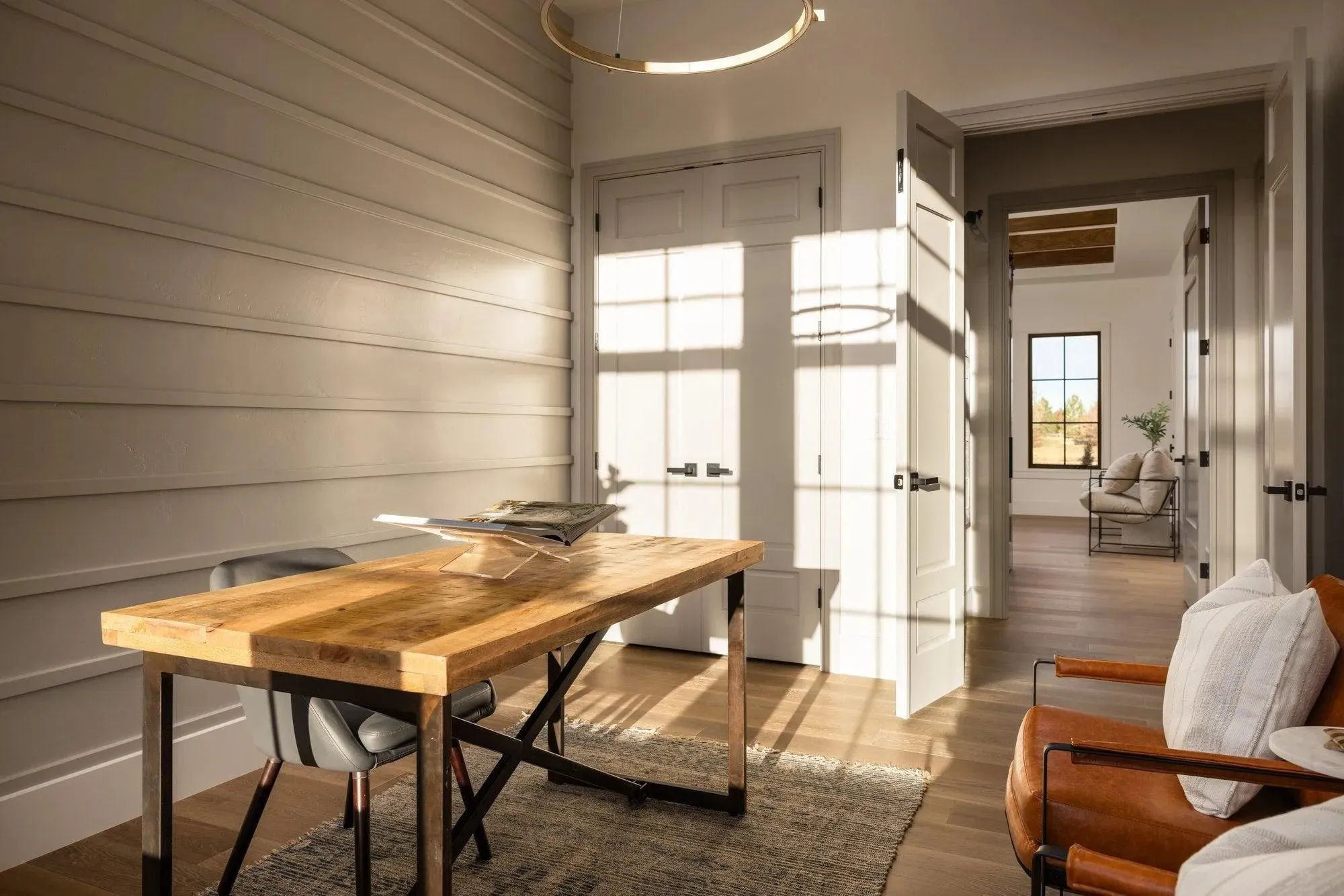 Elegant 2-Bedroom Home with Spacious Basement and Expansive Porches