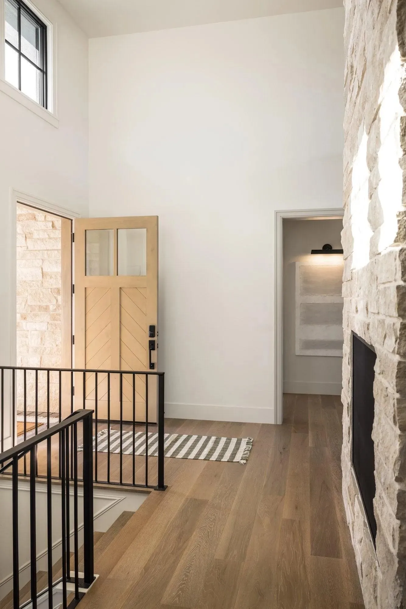 Elegant 2-Bedroom Home with Spacious Basement and Expansive Porches