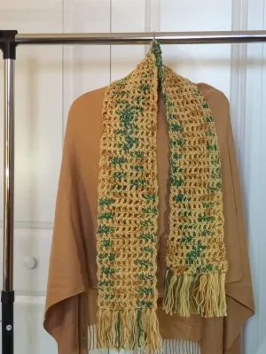 Gold multi colored scarf with fringe.