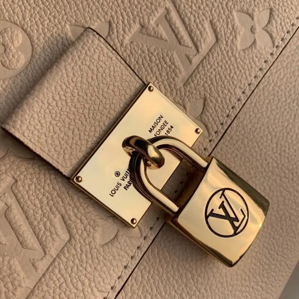 Marignan Messenger Bag In Empreinte Leather M44545 Crème Beige/caramel 2019 Collection