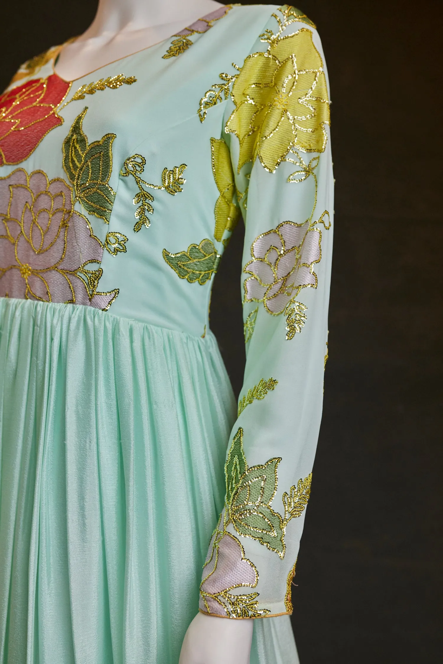 Mint Colored Georgette gown with multi-colored Floral design and sequence