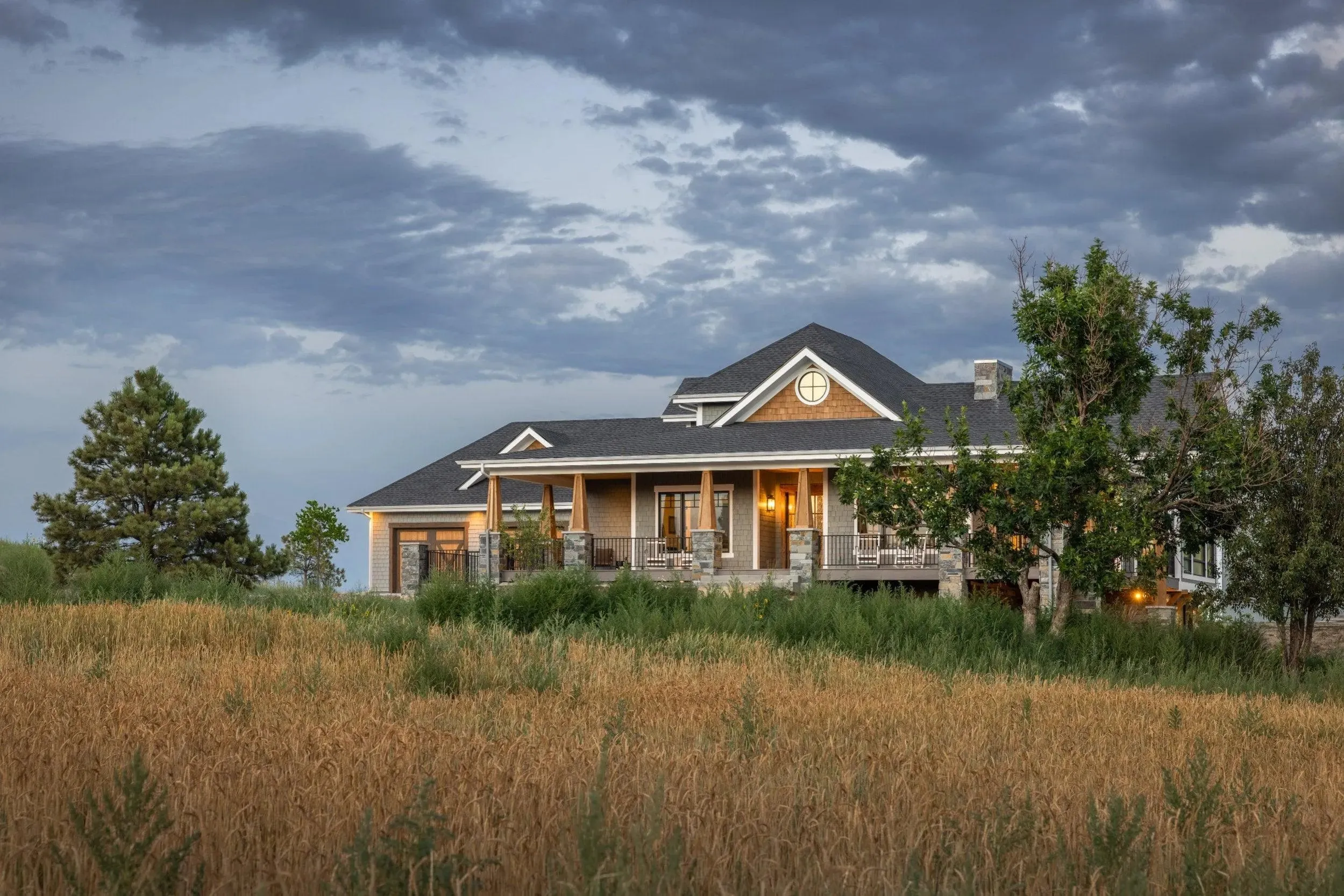 Spacious 4-Bedroom Home Plan with Walkout Basement and Expansive Porches