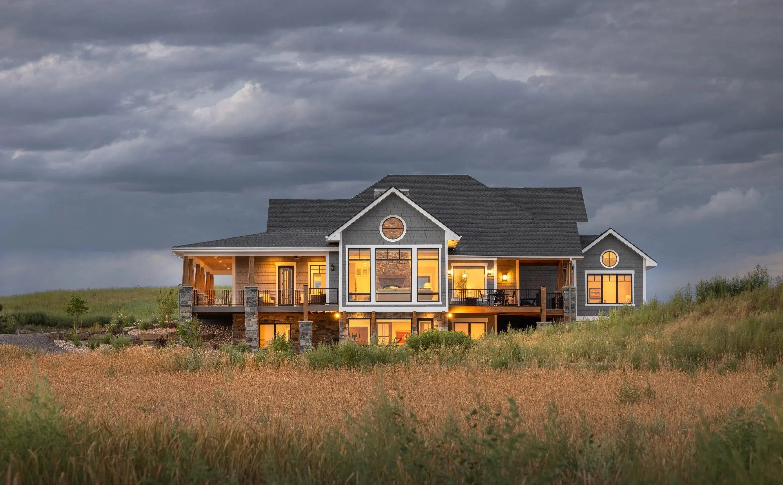 Spacious 4-Bedroom Home Plan with Walkout Basement and Expansive Porches