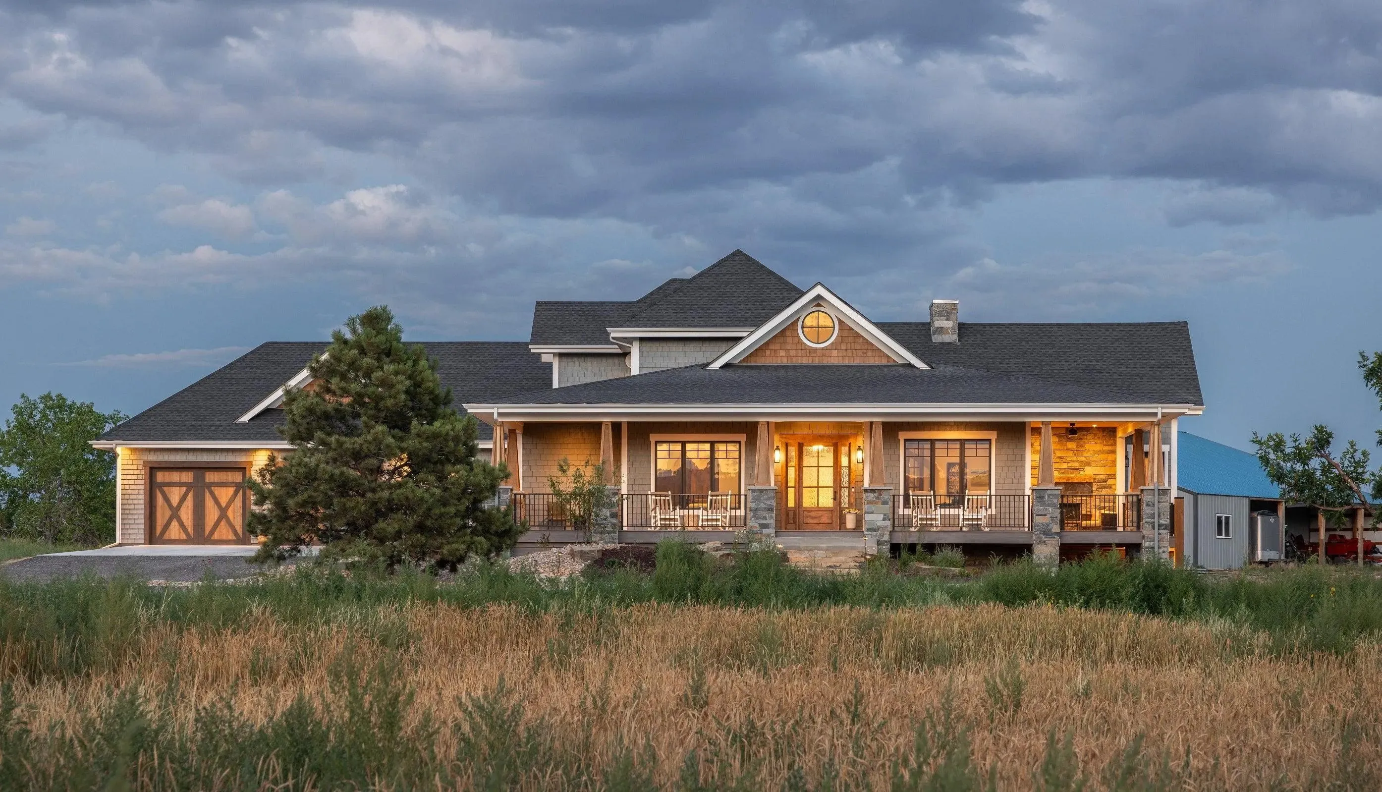 Spacious 4-Bedroom Home Plan with Walkout Basement and Expansive Porches