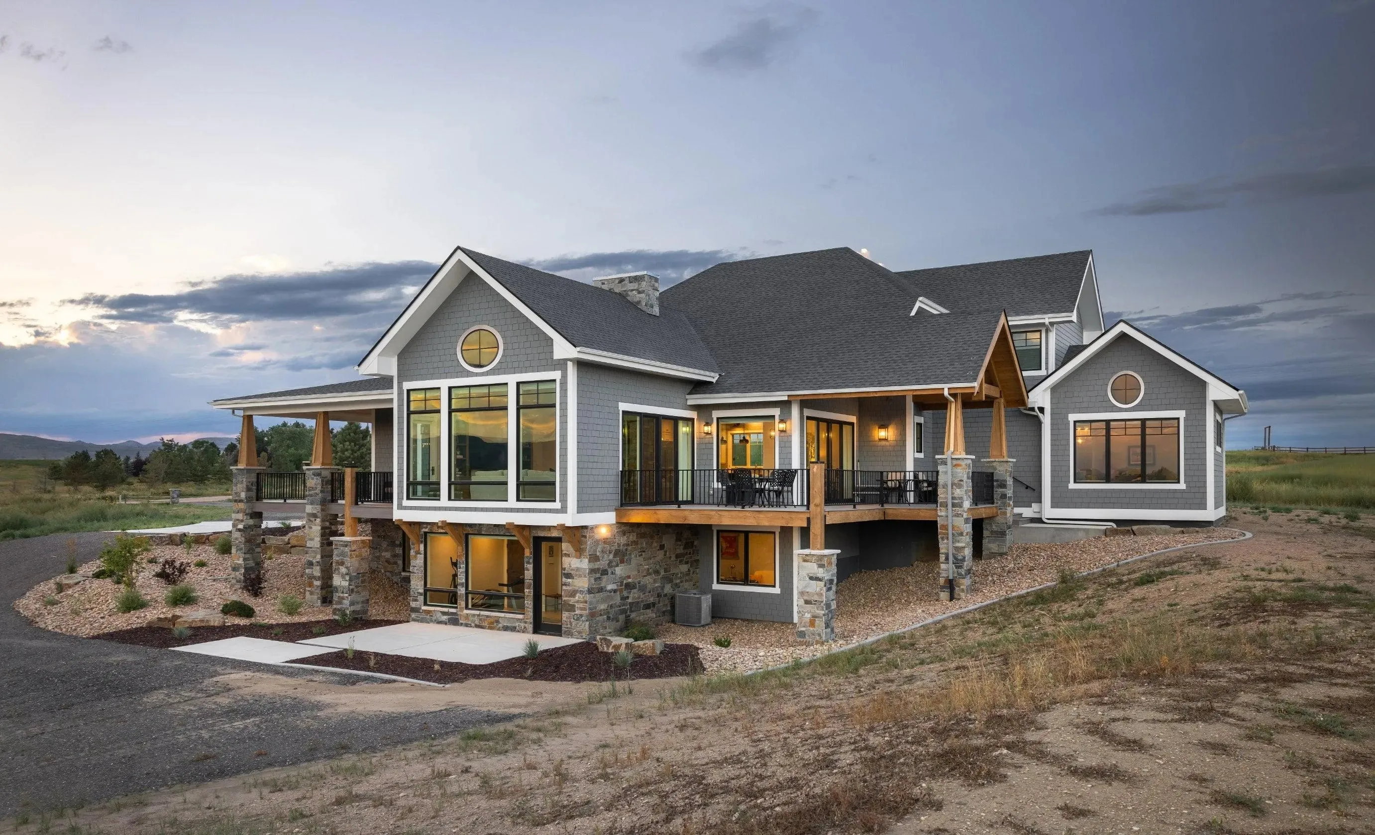 Spacious 4-Bedroom Home Plan with Walkout Basement and Expansive Porches