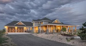 Spacious 4-Bedroom Home Plan with Walkout Basement and Expansive Porches