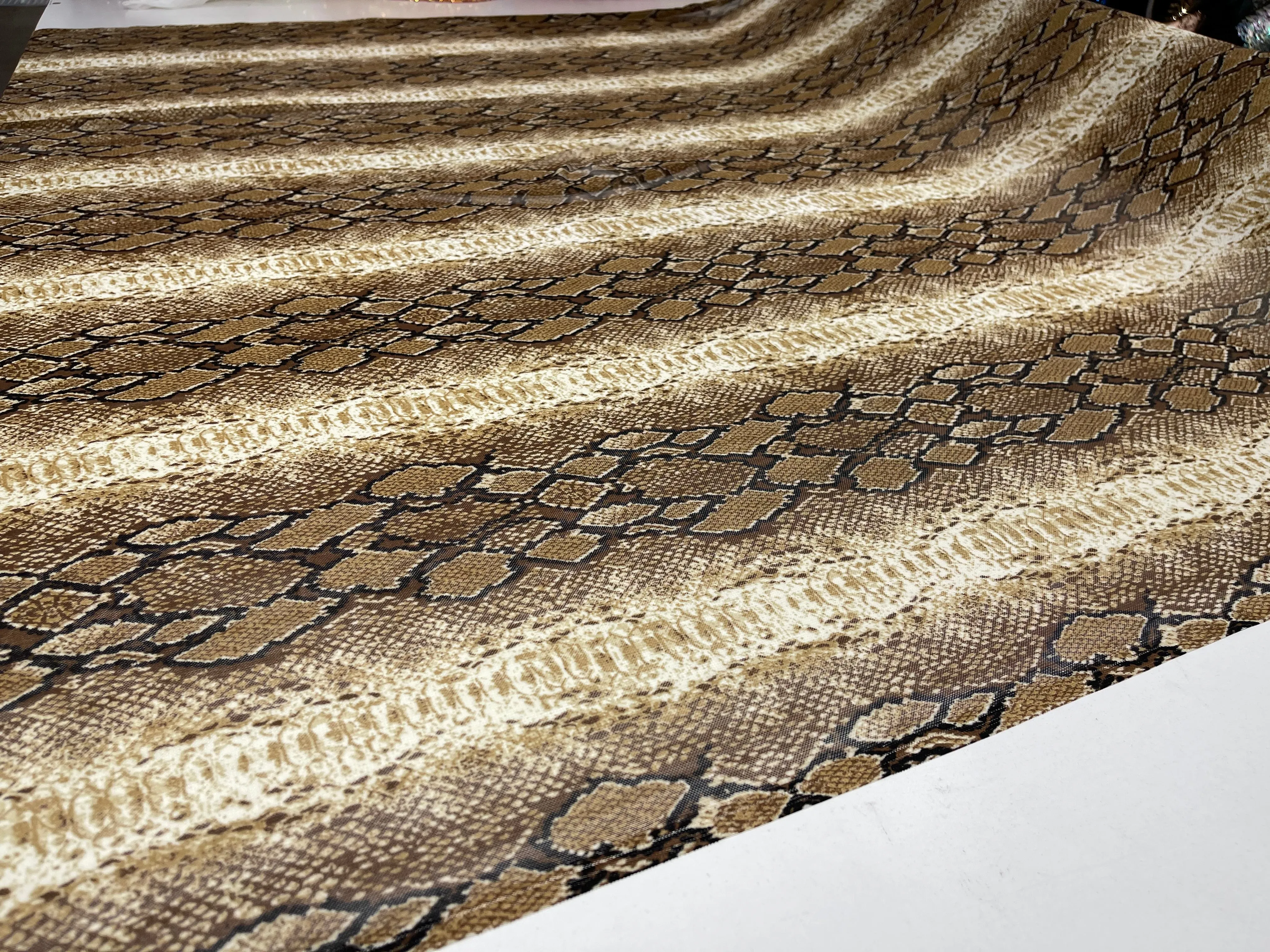 Tan/ Brown/ Black rattle snake design on a power mesh 4-way stretch 58"-Sold by the yard.