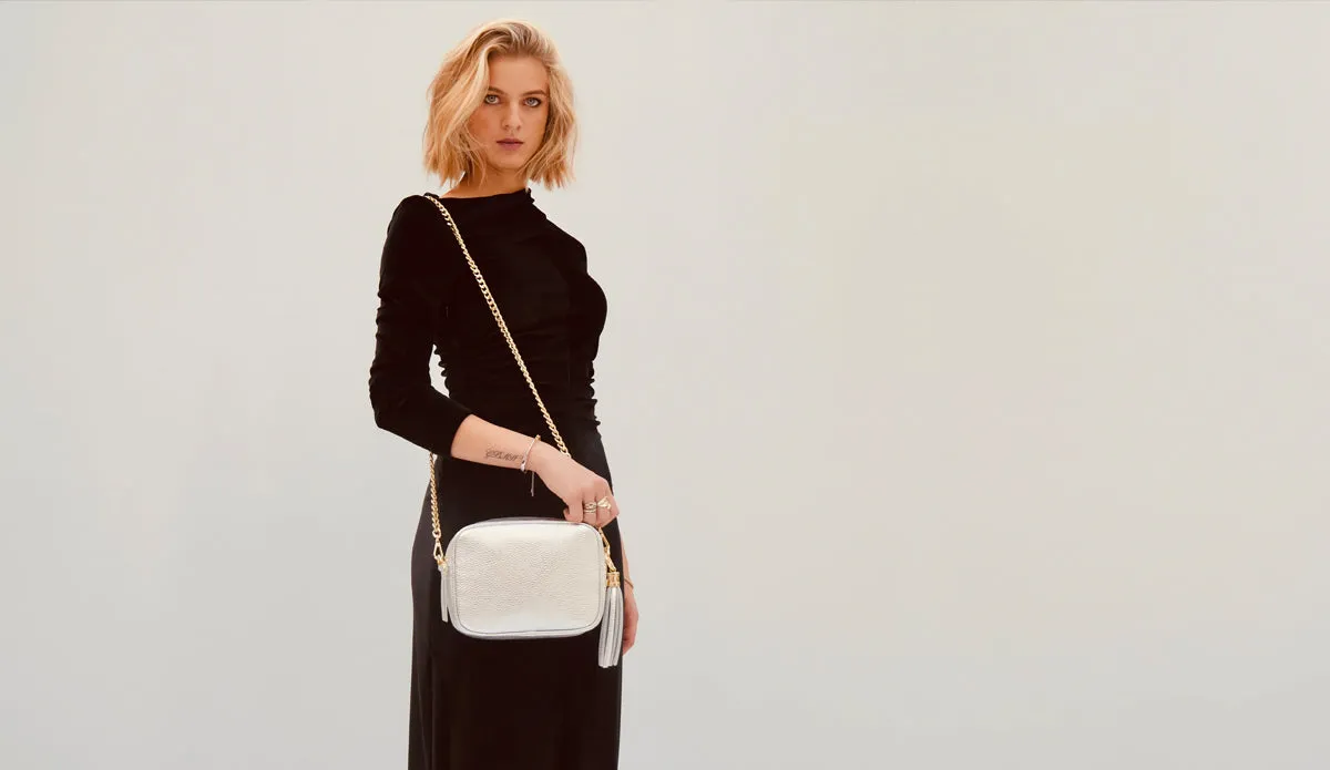 The Tassel Silver Leather Crossbody Bag With Black & White Giraffe Strap