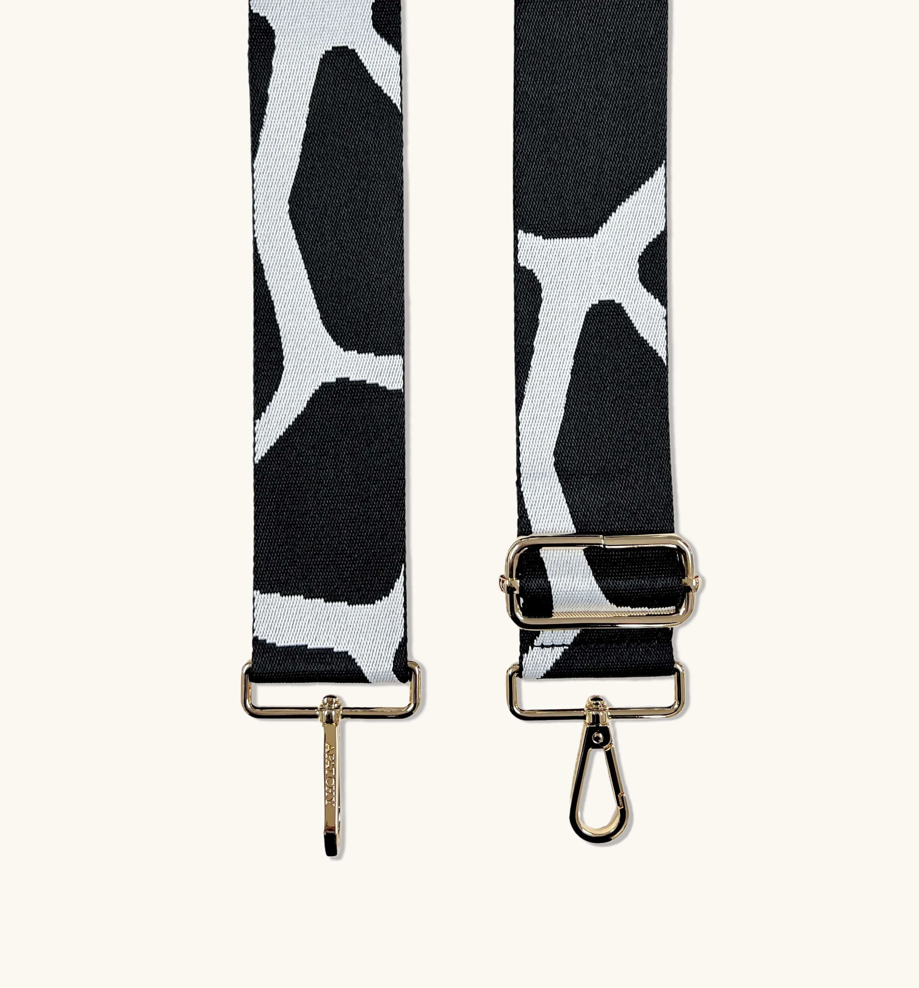 The Tassel Silver Leather Crossbody Bag With Black & White Giraffe Strap