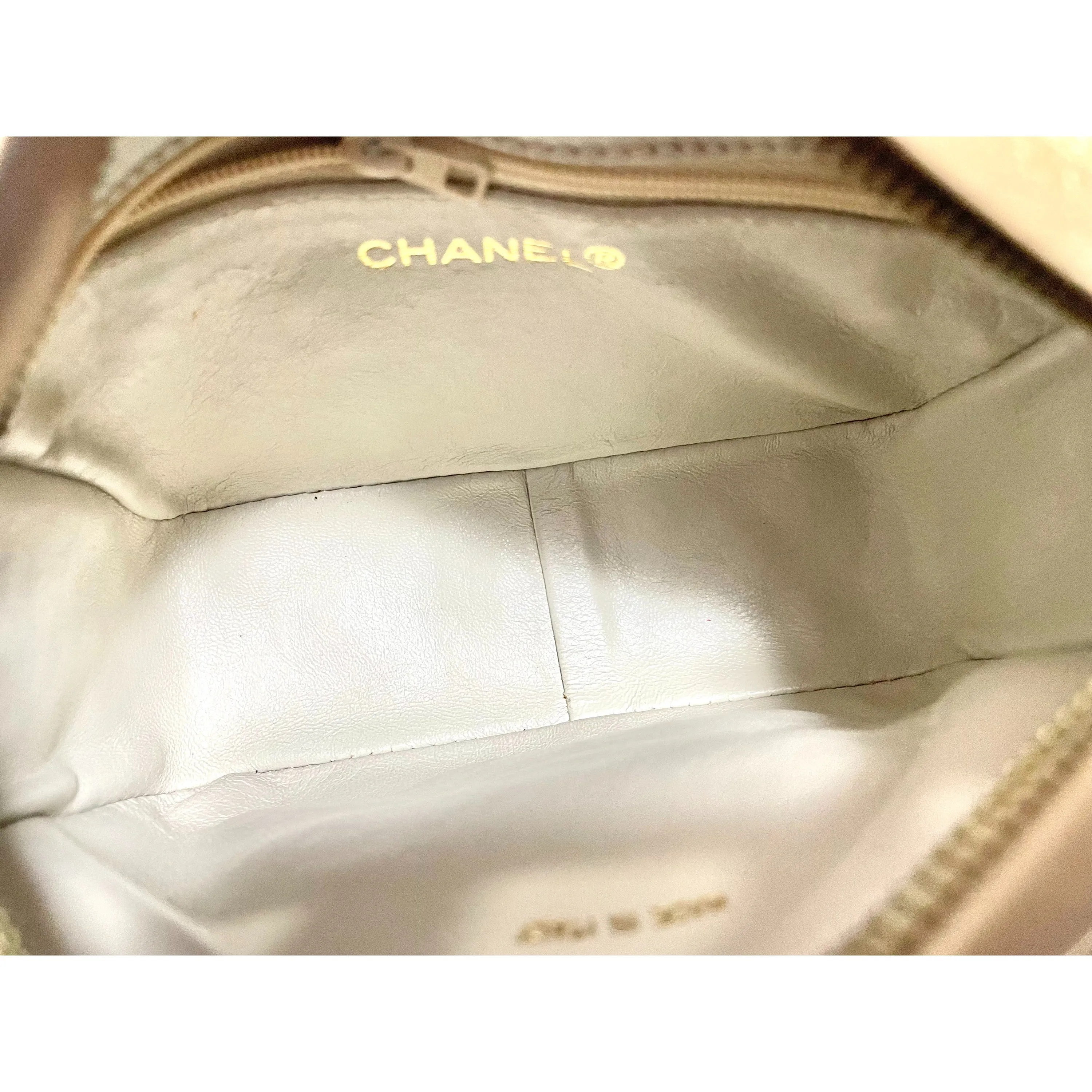Vintage Chanel tanned beige lambskin camera bag style chain shoulder bag with fringe and CC stitch mark on pentagon flap. 051205ac3